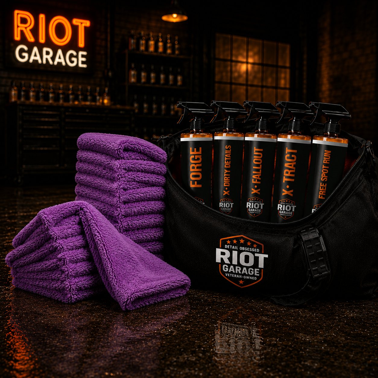 RECON — stacks of 16x16 ultra plush finishing towels with the Riot Garage duffel bag