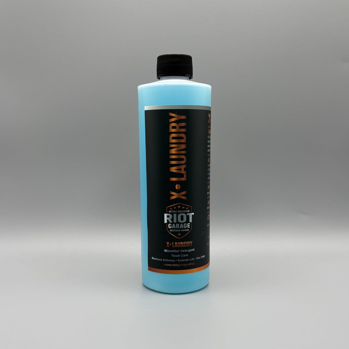 X·LAUNDRY Microfiber Detergent 16 oz bottle by Riot Garage — restores softness and absorbency, wax and sealant safe