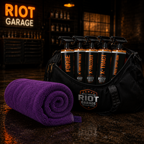 DEBRIEF — 24x36 twisted loop drying towel rolled with the Riot Garage duffel bag and Riot Garage neon sign